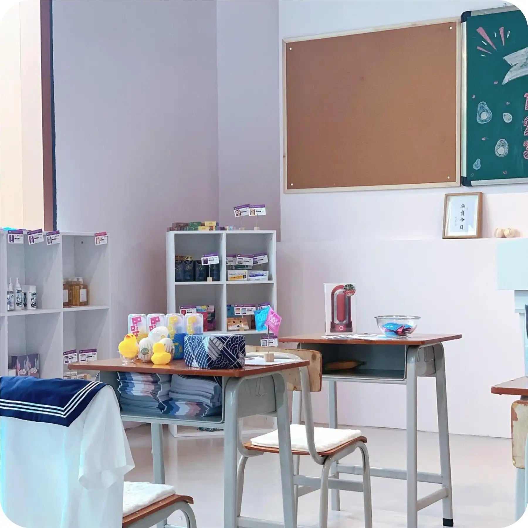 Classroom desks with merchandise.